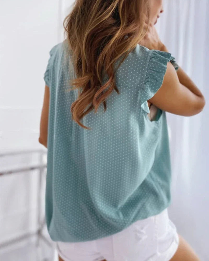 Elegante ärmellose Bluse mit Rüschen und Schleifendetail