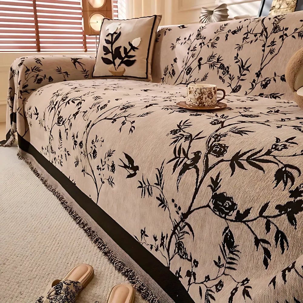 Eleganter Überwurf mit Blumenmuster und Fransenbesatz