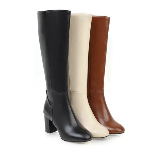 Kniehohe Stiefel mit Absatz und Reißverschluss für Damen. Elegantes Design trifft auf alltäglichen Komfort.