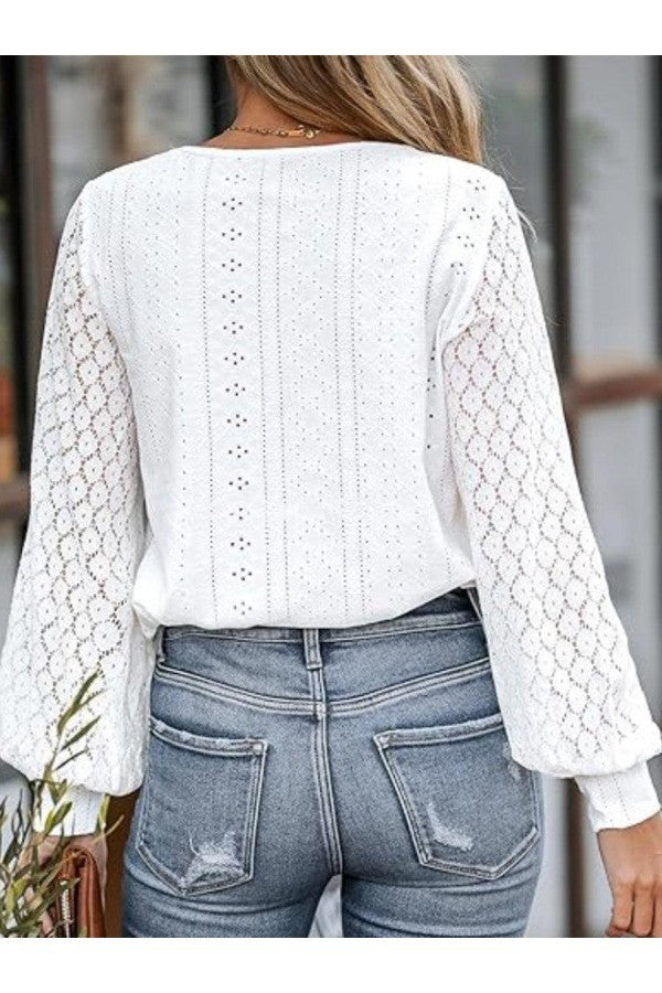 Elegante Bluse mit Spitzendetails und V-Ausschnitt