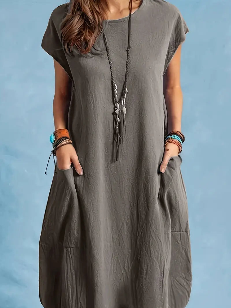 Elegantes Midikleid mit Fledermausärmeln und Taschen - lässig und bequem