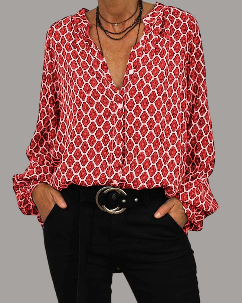 Damenbluse mit V-Ausschnitt und geometrischem Muster